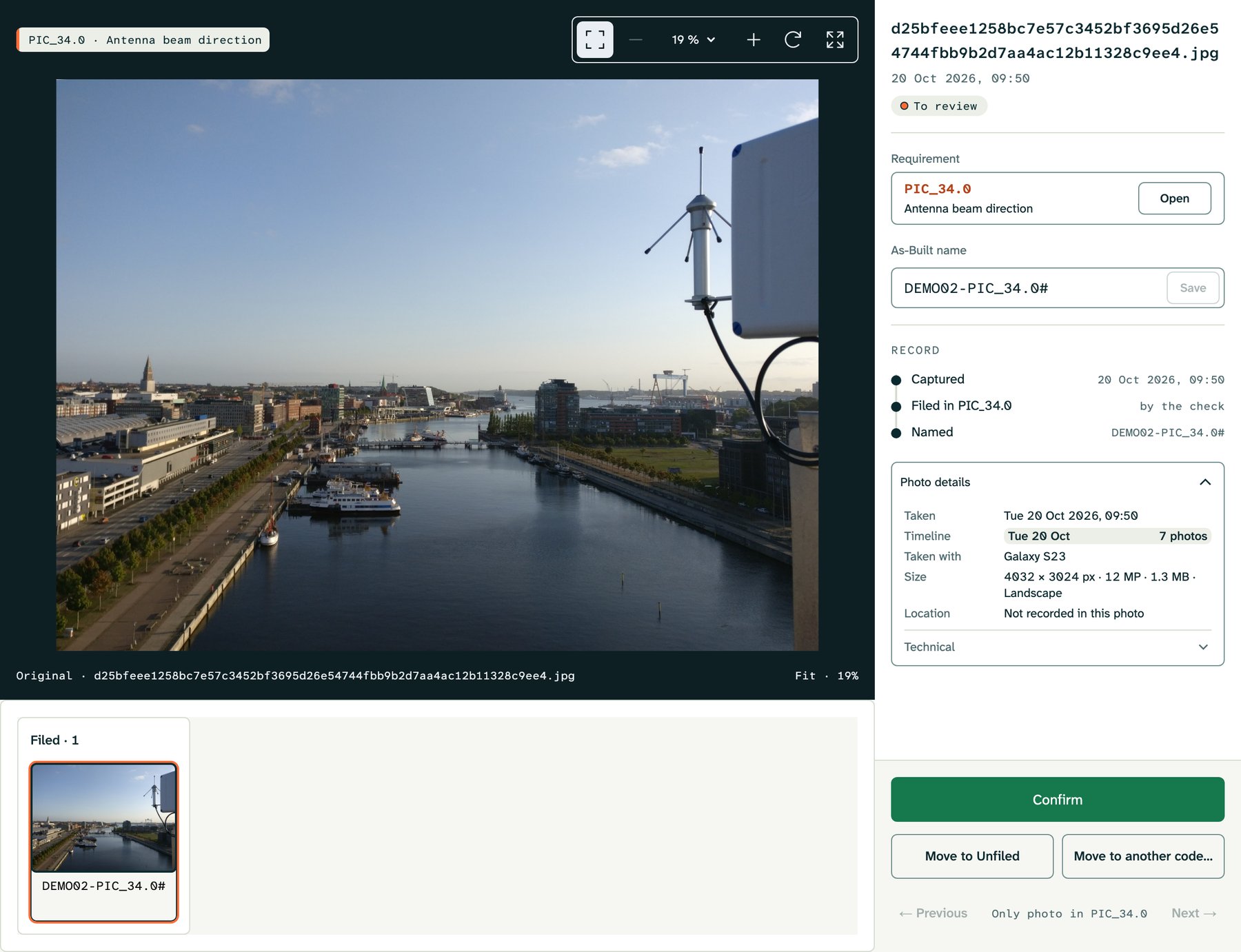 Viewer: a rooftop view over a harbour with an antenna in the foreground, filed in PIC_34.0 Antenna beam direction, photo details open, with Confirm, Move to Unfiled and Move to another code